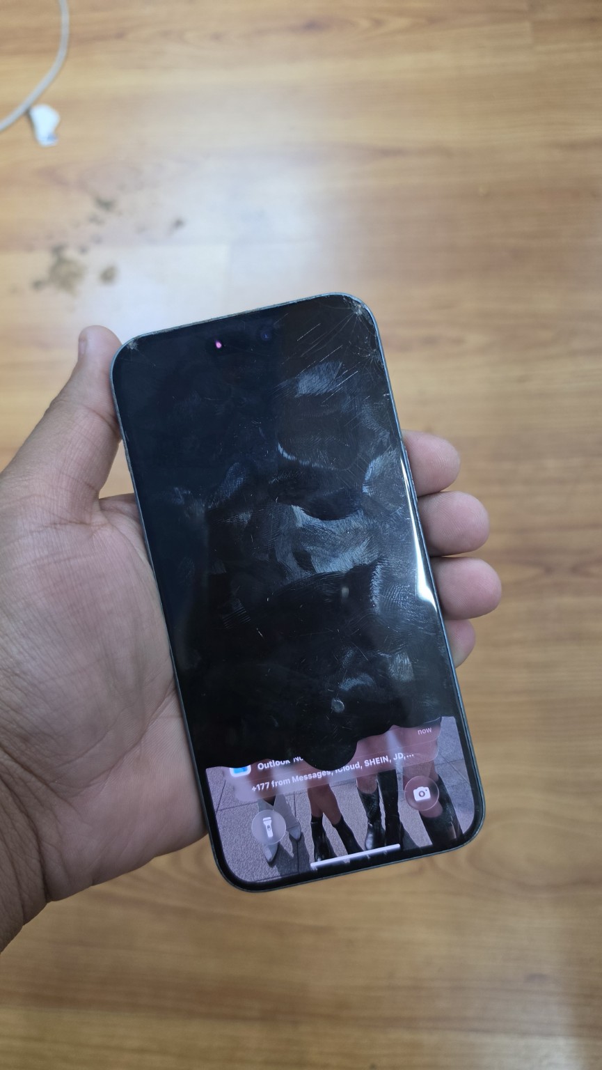 iPhone 16 Plus before repair with cracked glass and most of the display dark